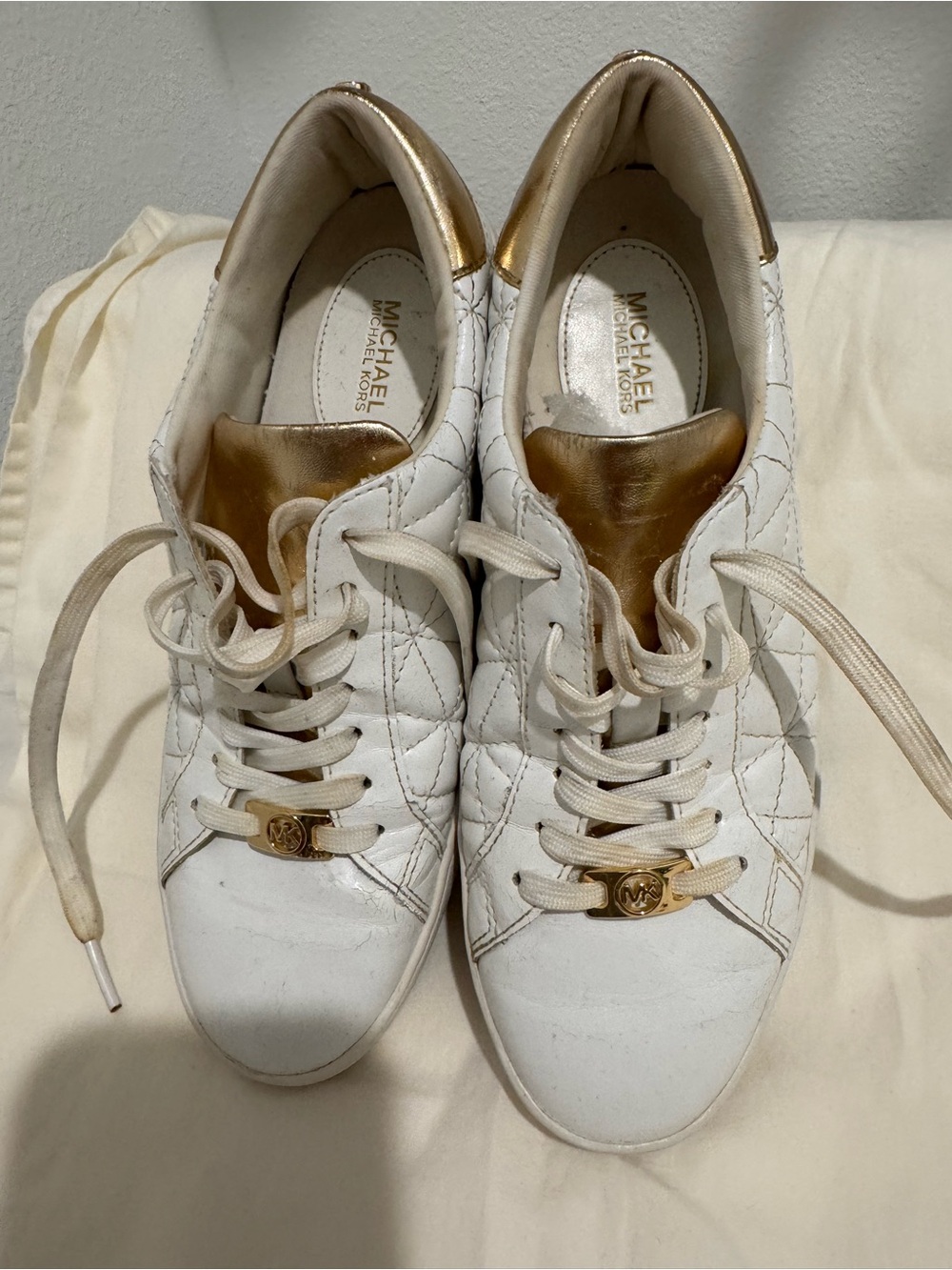 MICHAEL Michael Kors White Quilted Sneakers with Gold Accents